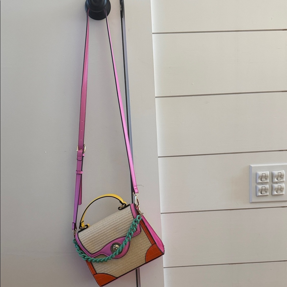 Cream Crossbody Bag with Pink Trim and Turquoise Chain Accent